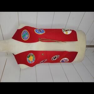 Vintage Cub Scout 1980-81 red felt vest with 7 patches